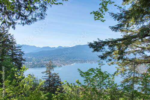 View of Burrard Inlet from Burnaby Mountain Park (Burnaby Mountain Conservation Area) in sunny day. photo