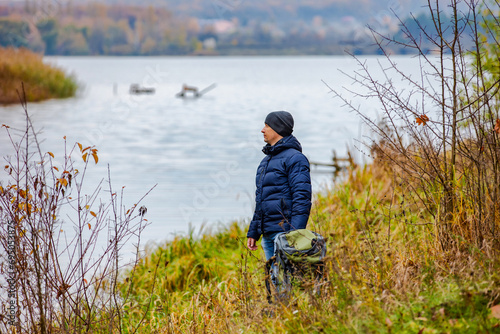 Autumn hiking vacation. Traveler on nature landscapes.