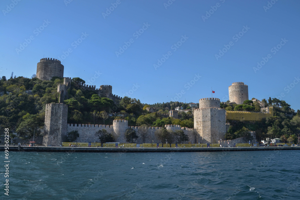 Rumeli Hisari, a medieval Ottoman fortress built by Sultan Mehmed II in the early 1450s, towers over Istanbul Turkey’s sparkling Bosphorus on hills along the Europe side