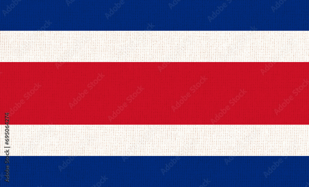 Flag of Republic of Costa Rica. Costa Rica flag on fabric surface