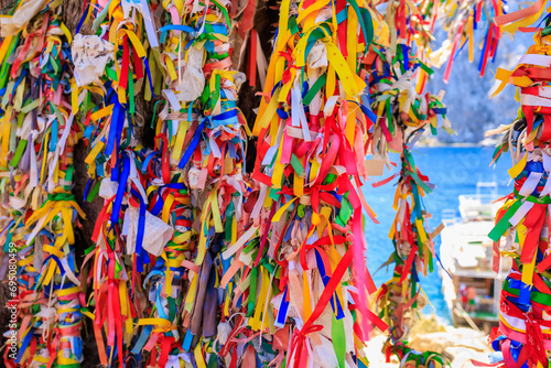 Colored ribbons for good luck, popular customs and superstitions. Background with selective focus and copy space