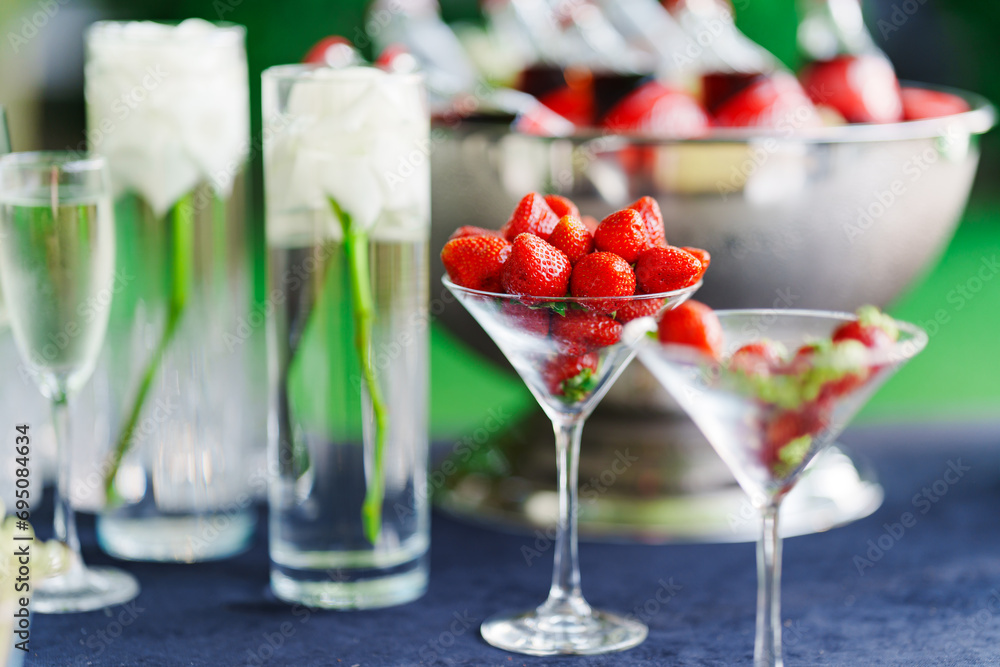 Strawberries in a glass as an appetizer for champagne at a banquet. Strawberries in a glass as an appetizer for champagne at a banquet.