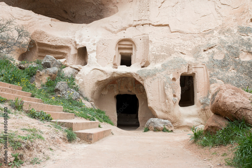 entrance of one of the churches cut into volcanic rocks in the Byzantine times, Cappadocia, Turkey entrance of one of the churches cut into volcanic rocks in the Byzantine times, Cappadocia, Turkey