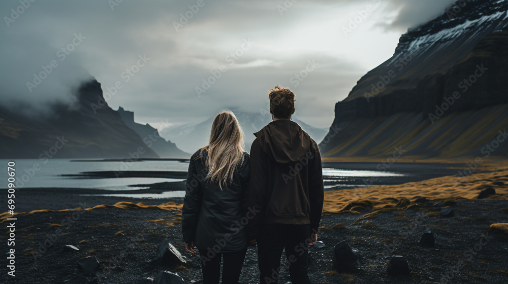 A traveling couple enjoys incredible views of the mountains