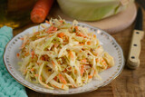Traditional cabbage salad Coleslaw with carrots and mayonnaise dressing