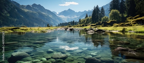 Very beautiful mountain lake in the green mountains photo