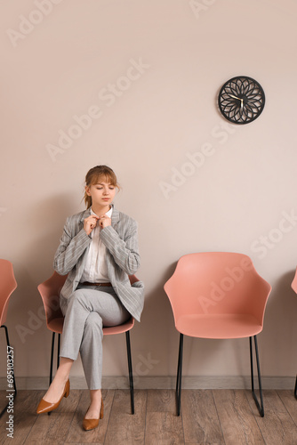 Female applicant waiting fo...
