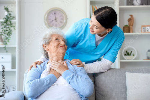 Senior woman with nurse at home © Pixel-Shot