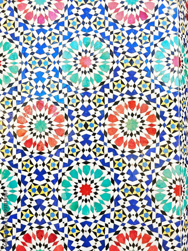 Detail of decoration in geometric tiling of an Arab wall in Fez, Morocco