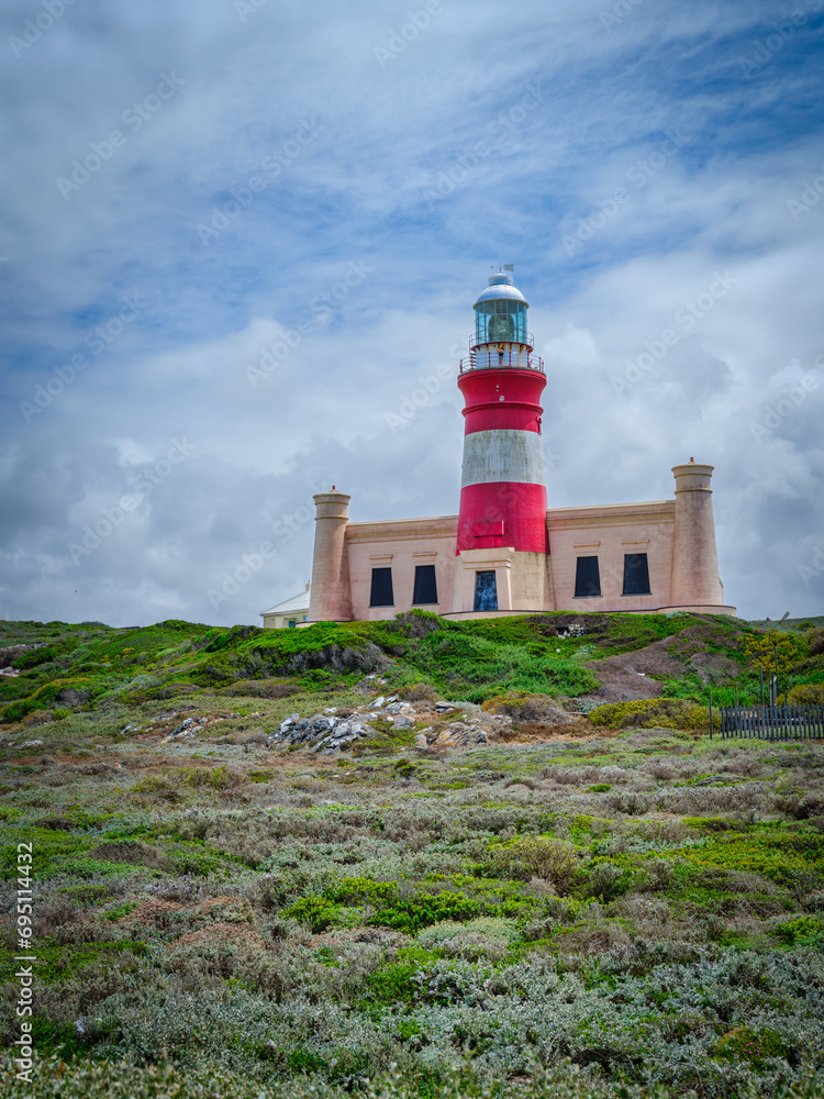 Vertical shot of the Cape Agulhas Lighthouse, southernmost tip of Africa during a cloudy day, L'Agulhas, South Africa