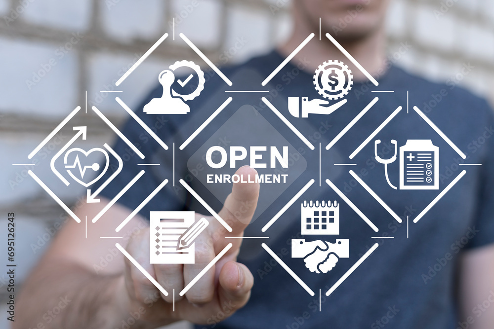 Man using virtual touch screen presses inscription: OPEN ENROLLMENT. Open Enrollment Medical Business concept. Open Enrollment 2024.