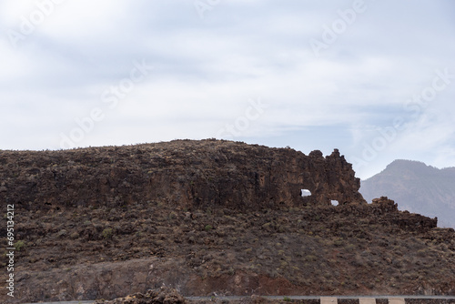 landscape with clouds and hole mountain