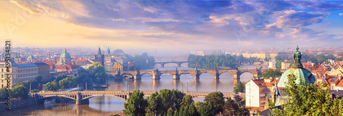 City summer landscape, panorama, banner - top view of the historical center of Prague and the Vltava river with bridges, Czech Republic