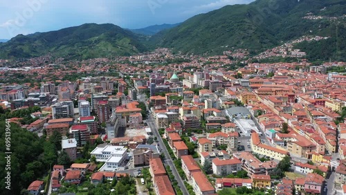 Aerial video of Massa, a city located at the foot of the Apuan Alps Regional Natural Park in the Apennines in Tuscany, Carrara. Italy photo