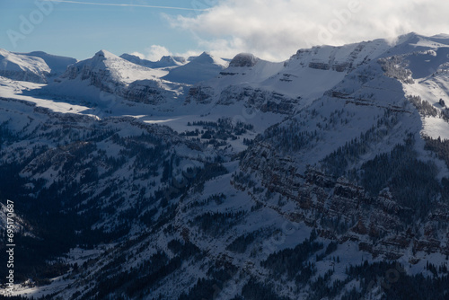 The Teton Range is a mountain range of the Rocky Mountains in North America. It extends for approximately 40 miles in a north–south direction through the U.S. state of Wyoming, east of the Idaho. photo