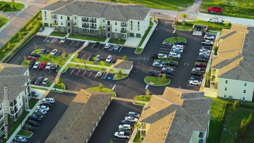 Top view of new apartment condos in Florida suburban area. Family housing in quiet neighborhood. Real estate development in american suburbs photo