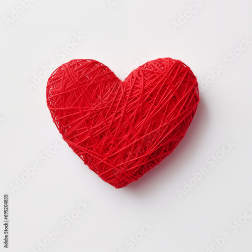 Top view of a red heart made of threads on a white isolated surface. Valentine s Day concept. Generative AI