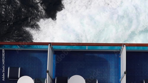 big waves hitting the side of a cruise ship photo