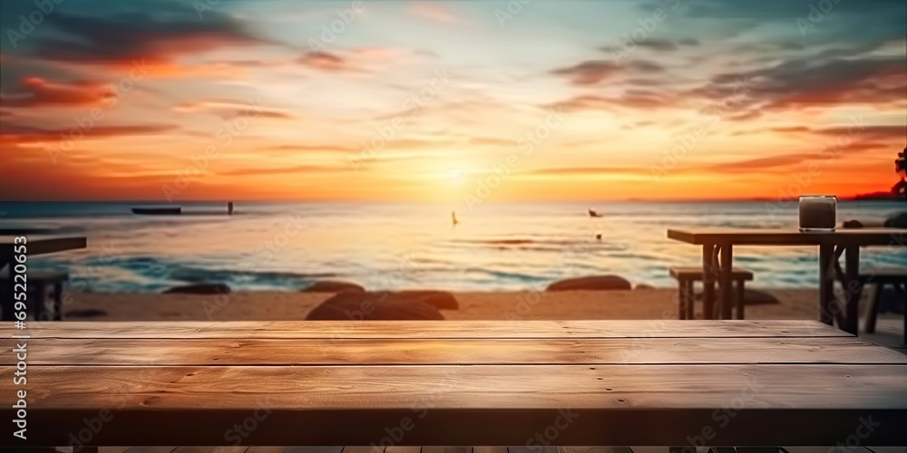 Sunset beach scenery. Captivating image captures serene beauty of sunset at beach. Warm hues of orange and blue dominate sky as sun begins to dip below horizon casting soft glow over tranquil sea