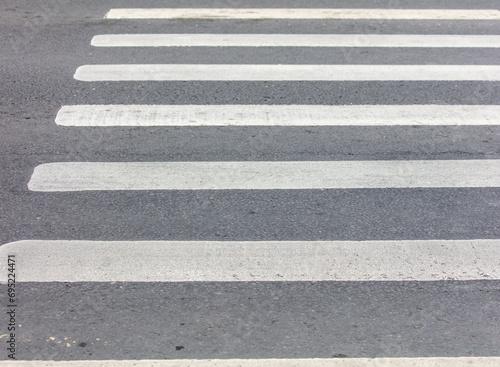 Pedestrian crossing on the road as a background