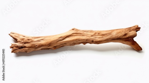 A piece of driftwood resting on a clean, white surface. Suitable for various design projects