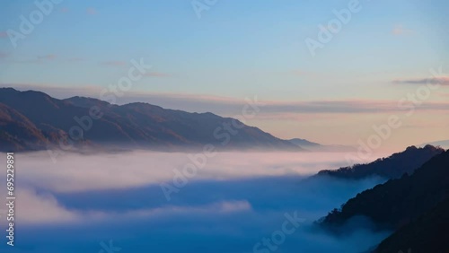 Wallpaper Mural A timelapse of the sea of clouds at the top of the mountain in Kyoto telephoto shot Torontodigital.ca