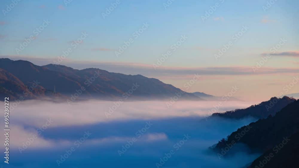 A timelapse of the sea of clouds at the top of the mountain in Kyoto telephoto shot A timelapse of the sea of clouds at the top of the mountain in Kyoto telephoto shot