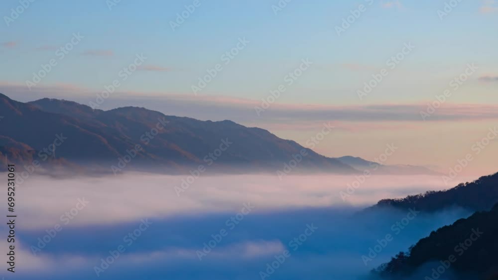 A timelapse of the sea of clouds at the top of the mountain in Kyoto telephoto shot A timelapse of the sea of clouds at the top of the mountain in Kyoto telephoto shot