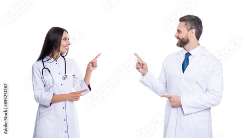 healthcare practitioner doctor isolated on white. medicine and healthcare. doctor pointing finger on advertisement. health care advertisement. two doctor work in medicine