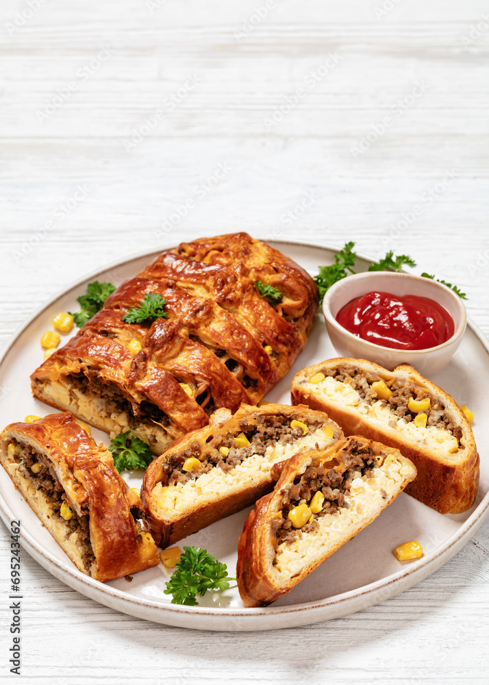 Breakfast Braid with ground beef, eggs, top view Breakfast Braid with ground beef, eggs, top view
