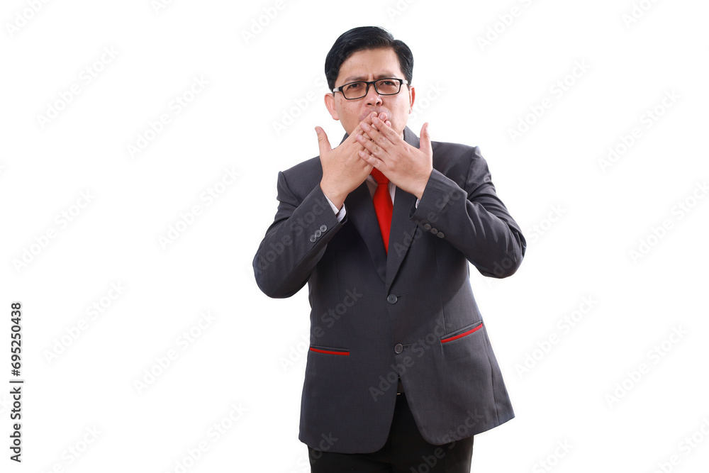 Asian businessman covering mouth with hand for mistake. Isolated on white background Asian businessman covering mouth with hand for mistake. Isolated on white background