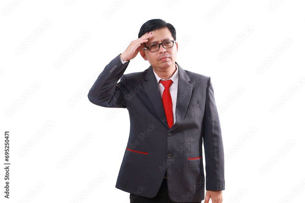 Stressed asian businessman standing while holding his head. Isolated on white background Stressed asian businessman standing while holding his head. Isolated on white background