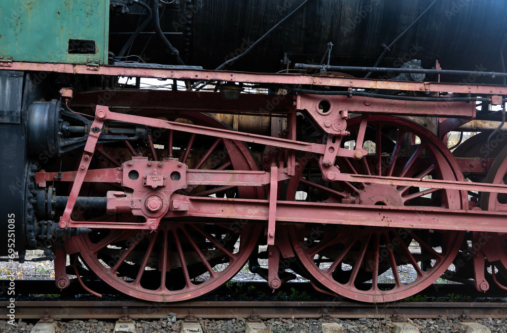 Transmission system of an old train. Traction wheels of a steam train