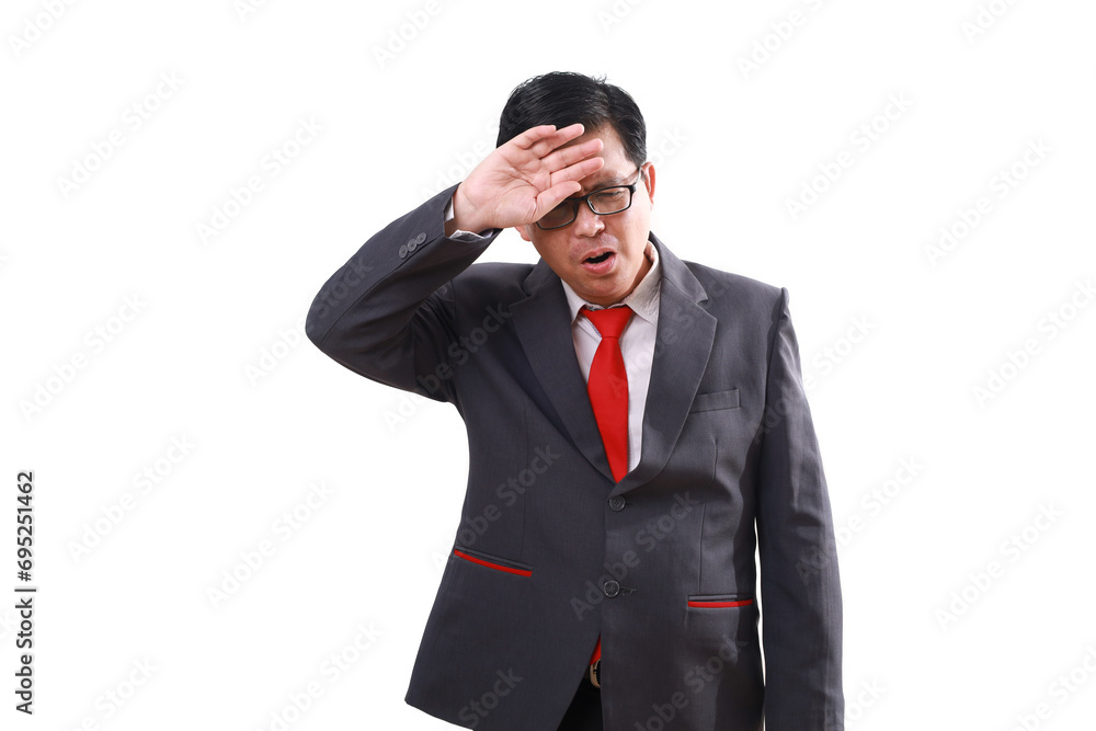 Stressed asian businessman standing while holding his head, suffering from headache. Isolated on white Stressed asian businessman standing while holding his head, suffering from headache. Isolated on white