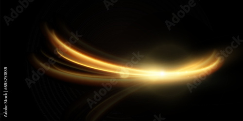 Light effect of shiny gold lines.Gold color glowing design element.Wavy bright stripes.