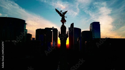 Aerial view Mexico city downtown angel de la independencia in reforma avenue, buildings at sunset  photo