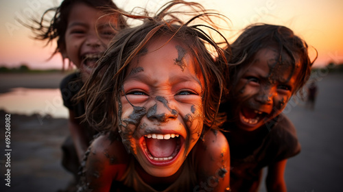 Cambodian Children enjoying the mud photo