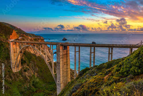 Bixby Bridge also known as Rocky Creek Bridge and Pacific Coast Highway at sunset near Big Sur in California, USA.