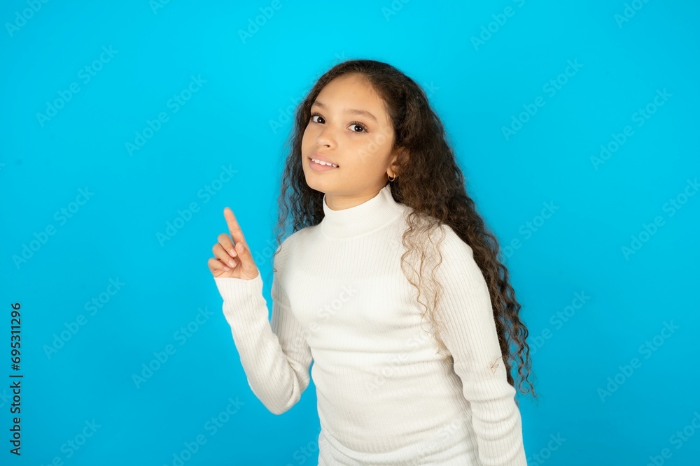 Profile photo of Young beautiful teen girl indicate finger empty space offer Profile photo of Young beautiful teen girl indicate finger empty space offer