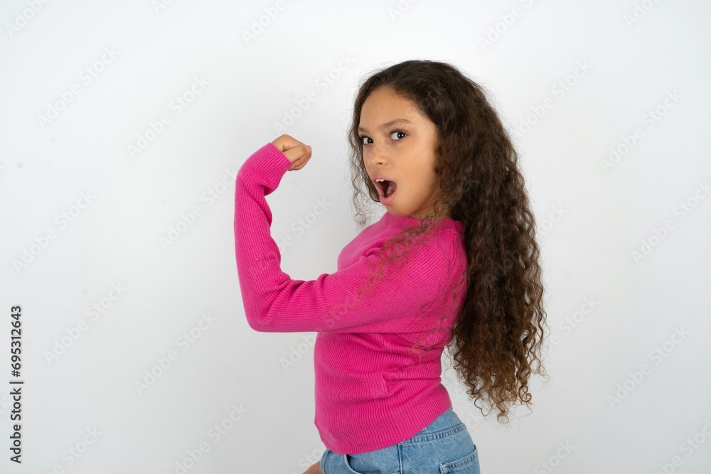 Profile side view portrait Young beautiful teen girl celebrates victory Profile side view portrait Young beautiful teen girl celebrates victory