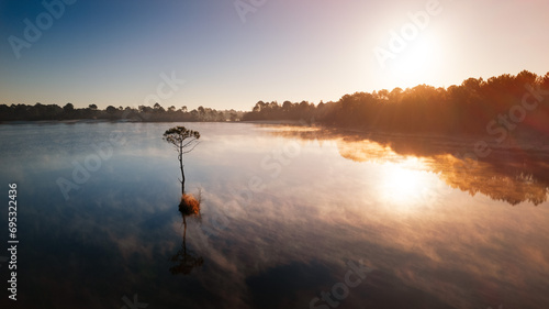 Sunrise sunlight above Lake Hostens with winter light