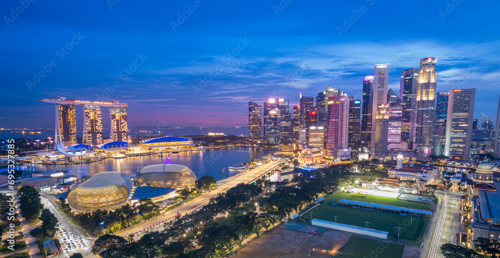 Singapore, Singapore - October 23, 2023: Singapore cityscape at dusk. Landscape of Singapore business building around Marina bay. Modern high building in business district area at twilight.