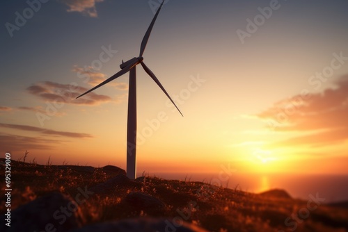 Single wind turbine at sunset, aerial view. Renewable energy, ecology, environment concept