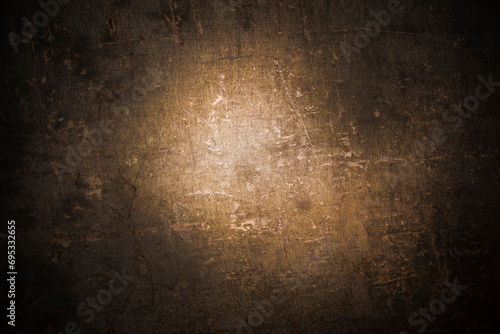 dark wall background. Empty workplace  in front of a package of abstracts.