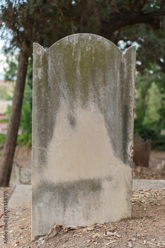 Ancient unmarked grave in a cemetery