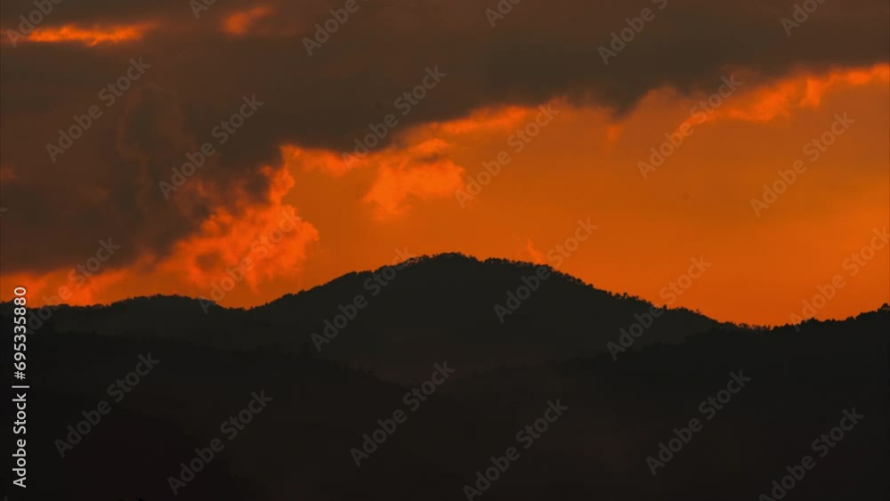 Time lapse of a beautiful nature morning with orange, yellow sunshine and fluffy clouds. Aerial view of colorful sky with clouds at sunrise. Time lapse of a beautiful nature morning with orange, yellow sunshine and fluffy clouds. Aerial view of colorful sky with clouds at sunrise.