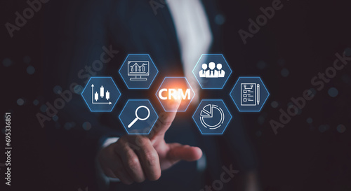 CRM. Customer Relationship Management, Businessman or client show global structure customer network technology, Data exchanges development, Customer service, Digital marketing online, Social media, HR