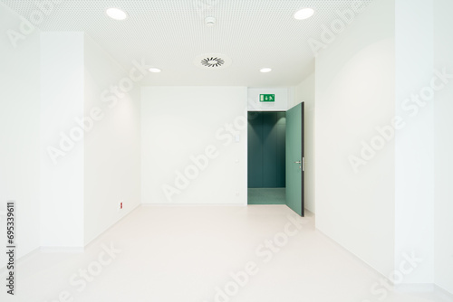 White room with open door in hospital