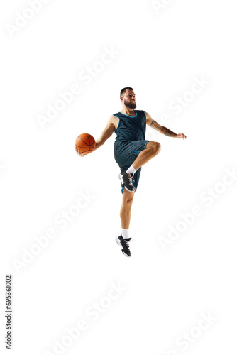 Basketball player in uniform demonstrates strength and focus during workout against pristine white background.