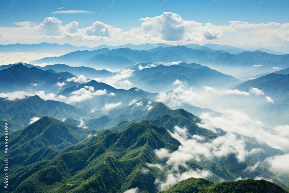 Mountain range rising through a sea of clouds, Generative AI